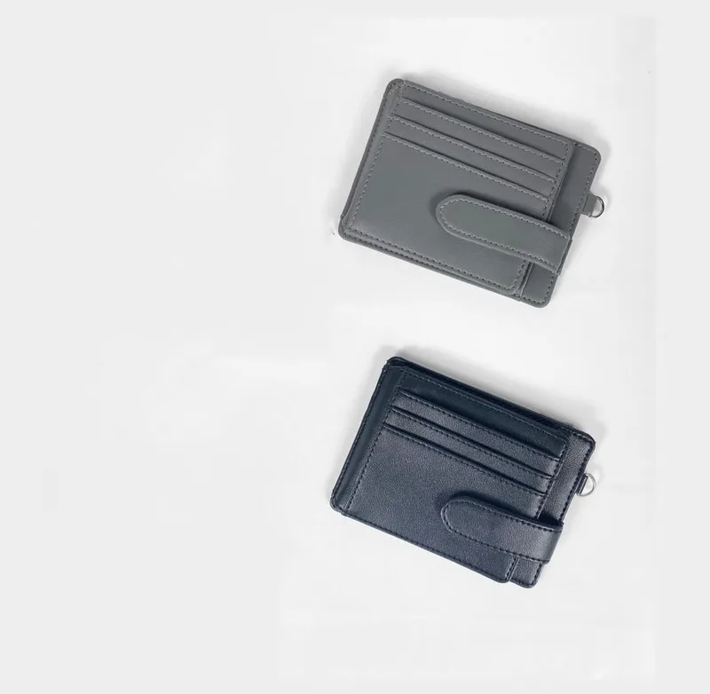 Dua card holder Side Flip berwarna abu-abu dan navy dengan slot kartu dan tali pengunci, diletakkan berjajar di atas latar putih